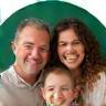Portrait photo of The Martin Family smiling together, happy clients of Voyages Échappées.